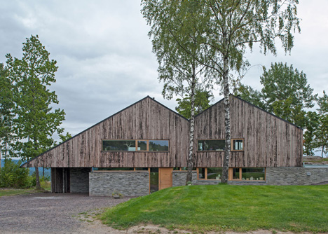 Double-gabled house overlooking a Norwegian fjord by Schjelderup Trondahl Architects