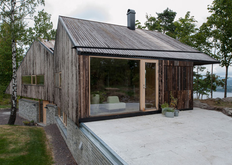 Double-gabled house overlooking a Norwegian fjord by Schjelderup Trondahl Architects