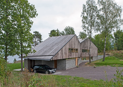 Double-gabled house overlooking a Norwegian fjord by Schjelderup Trondahl Architects