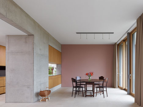 Stuttgart house by (se)arch with shingle-clad walls and a triple-height art gallery