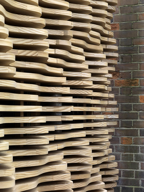 London flower kiosk with a wavy timber exterior by Buchanan Partnership