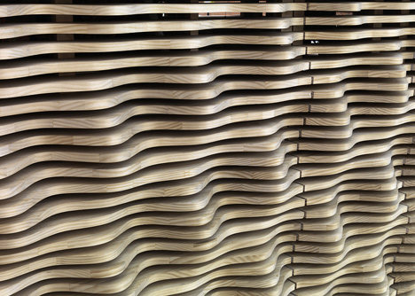 London flower kiosk with a wavy timber exterior by Buchanan Partnership