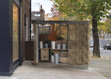 London flower kiosk with a wavy timber exterior by Buchanan Partnership