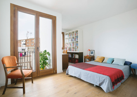Nook Architects add patterned floor tiles and window seat to Barcelona apartment renovation