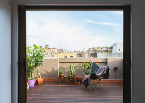 Nook Architects add patterned floor tiles and window seat to Barcelona apartment renovation