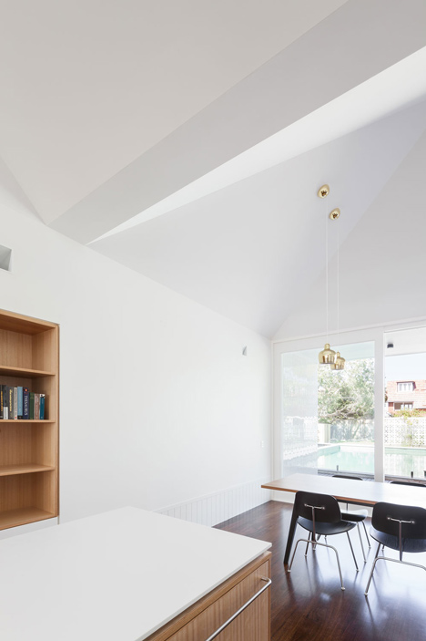Renovated single-storey house with distorted ceiling voids by Tribe Studio