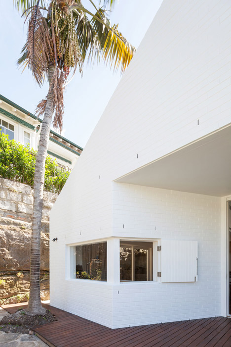 Renovated single-storey house with distorted ceiling voids by Tribe Studio