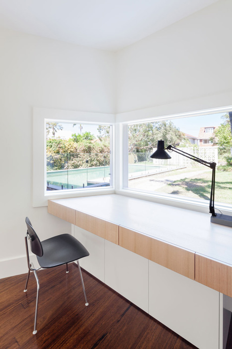 Renovated single-storey house with distorted ceiling voids by Tribe Studio