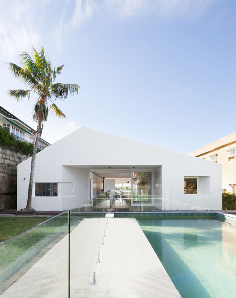 Renovated single-storey house with distorted ceiling voids by Tribe Studio