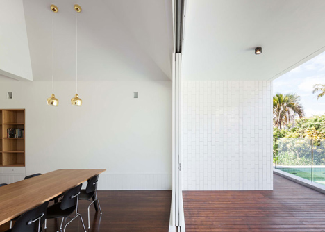 Renovated single-storey house with distorted ceiling voids by Tribe Studio