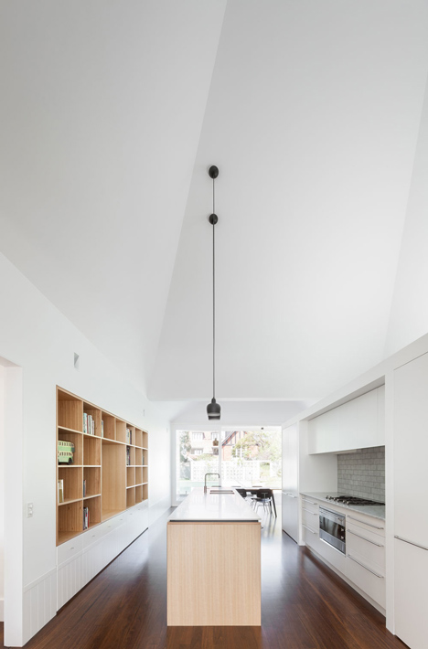 Renovated single-storey house with distorted ceiling voids by Tribe Studio