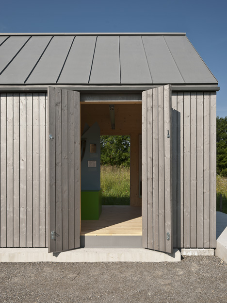 Small museum pavilion designed to resemble a rural shed by Von M