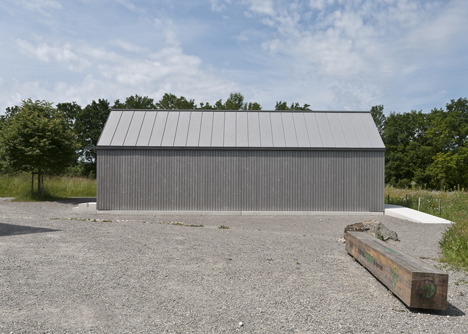 Small museum pavilion designed to resemble a rural shed by Von M