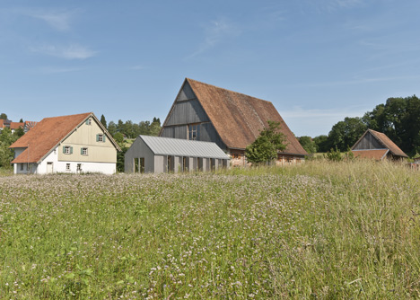 Small museum pavilion designed to resemble a rural shed by Von M