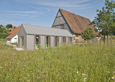 Small museum pavilion designed to resemble a rural shed by Von M