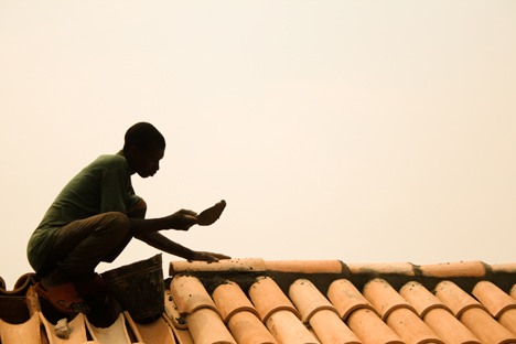Children's library in Africa with rammed earth walls by BC Architects