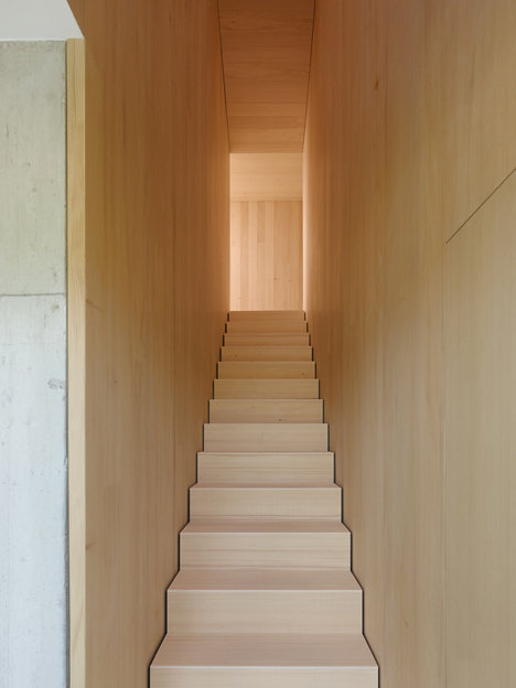 s_DenK house by SoHo Architektur has a kinked facade