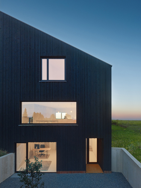 s_DenK house by SoHo Architektur has a kinked facade