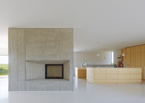 s_DenK house by SoHo Architektur has a kinked facade