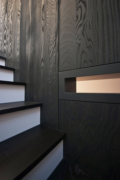 Long staircase spans converted London apartment by PATALAB Architecture