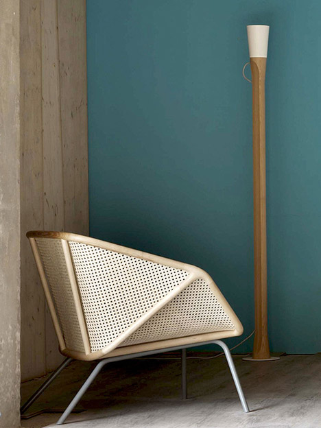 Colony armchair by Skrivo mixes steam-bent wood and rattan