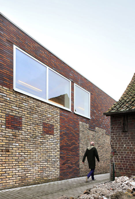 Community Centre Westvleteren by Atelier Tom Vanhee contrasts old and new bricks