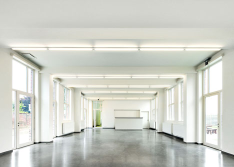 Community Centre Woesten by Atelier Tom Vanhee has a contrasting gabled extension