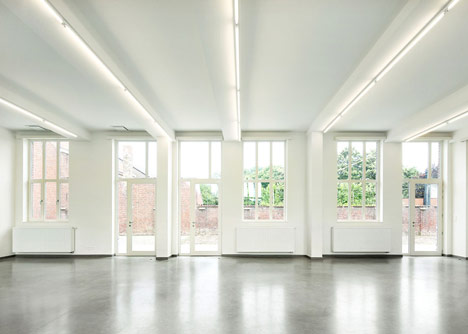 Community Centre Woesten by Atelier Tom Vanhee has a contrasting gabled extension