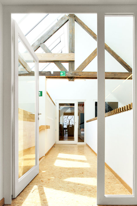 Community Centre Woesten by Atelier Tom Vanhee has a contrasting gabled extension