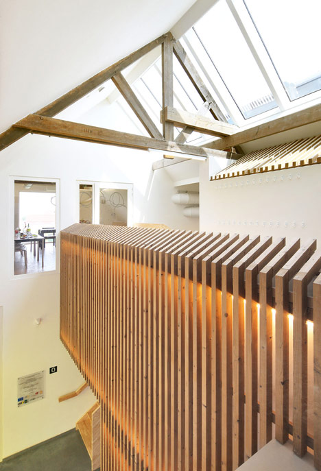 Community Centre Woesten by Atelier Tom Vanhee has a contrasting gabled extension