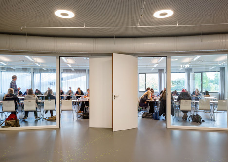 Ecological university building by BDG Architects features a cylindrical facade