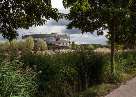 Ecological university building by BDG Architects features a cylindrical facade