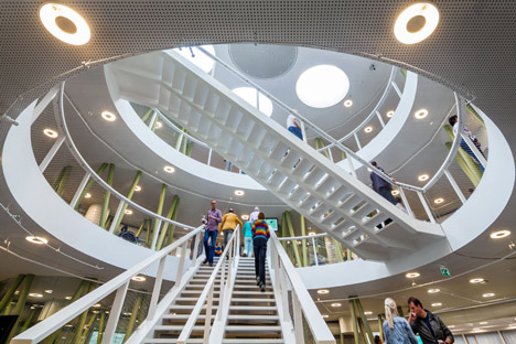 Ecological university building by BDG Architects features a cylindrical facade