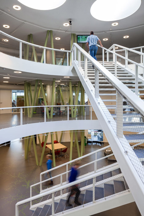 Ecological university building by BDG Architects features a cylindrical facade