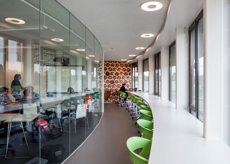 Ecological university building by BDG Architects features a cylindrical facade