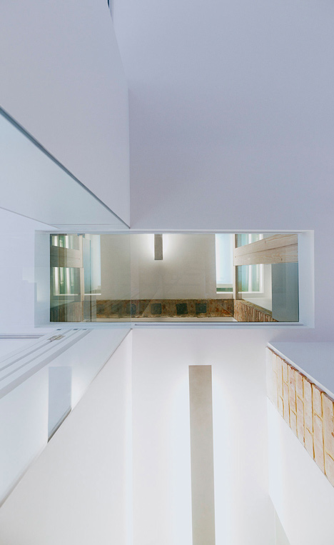 Edwardian townhouse renovation by Studio Octopi features windows in the floors