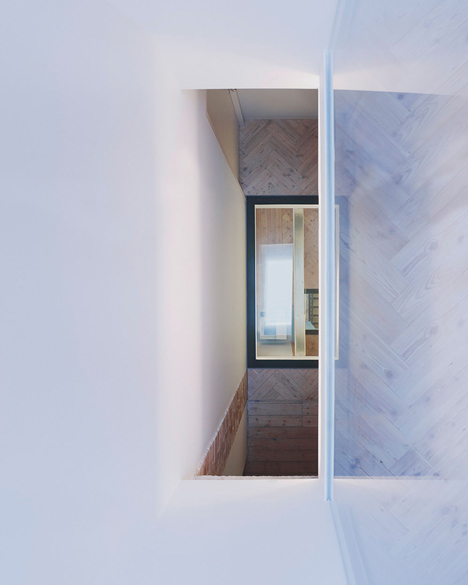 Edwardian townhouse renovation by Studio Octopi features windows in the floors