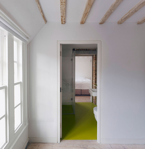Edwardian townhouse renovation by Studio Octopi features windows in the floors