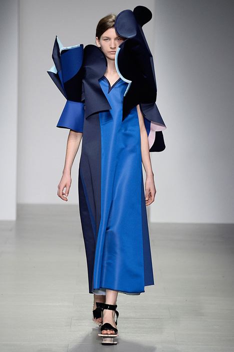 Giant flowers in Ondrej Adamek's graduate fashion collection obscure models