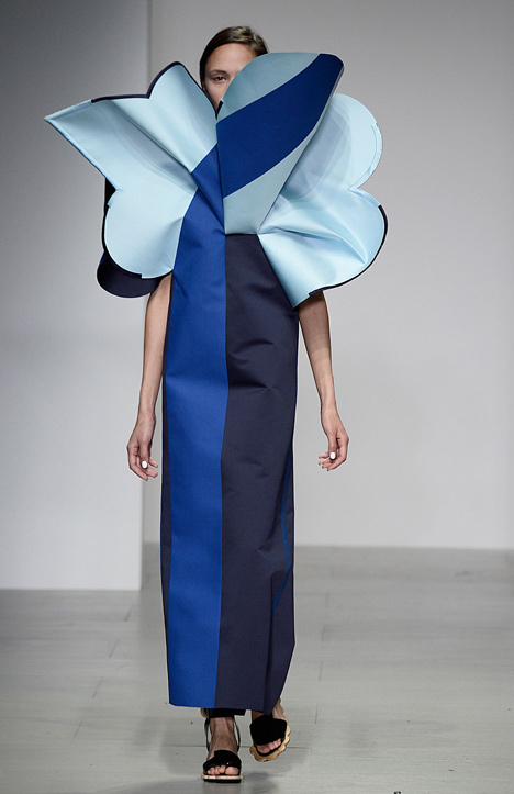 Giant flowers in Ondrej Adamek's graduate fashion collection obscure models
