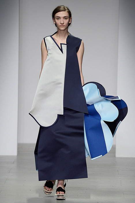 Giant flowers in Ondrej Adamek's graduate fashion collection obscure models