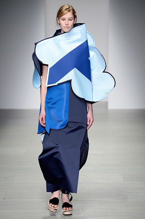 Giant flowers in Ondrej Adamek's graduate fashion collection obscure models