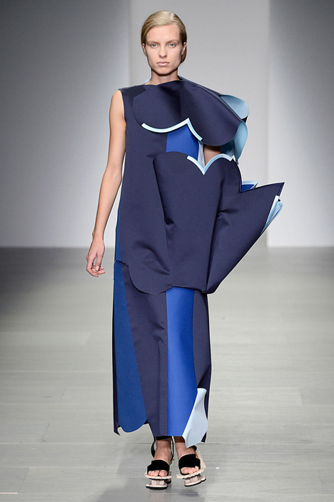 Giant flowers in Ondrej Adamek's graduate fashion collection obscure models