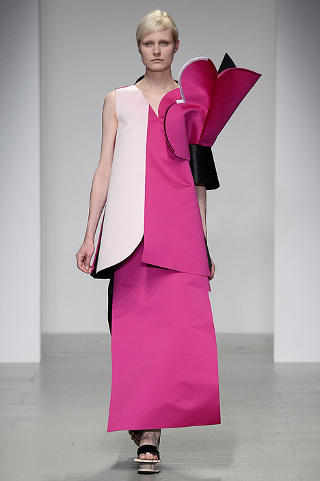 Giant flowers in Ondrej Adamek's graduate fashion collection obscure models