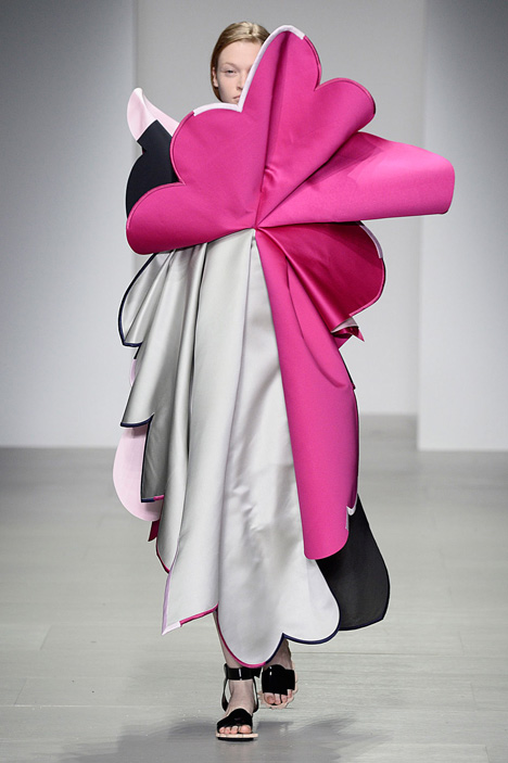 Giant flowers in Ondrej Adamek's graduate fashion collection obscure models