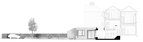 Section of House extension by GKMP Architects includes a wooden window seat