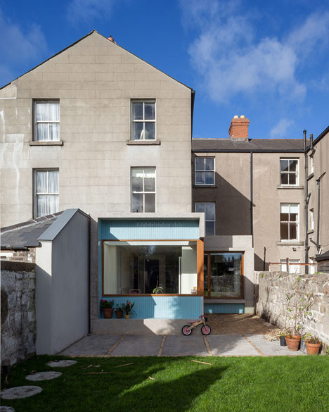 House extension by GKMP Architects includes a wooden window seat