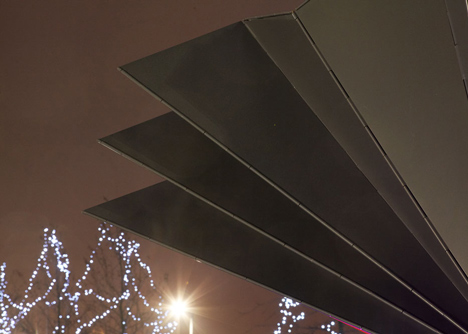 Folded metal kiosks by Make open like a paper fan
