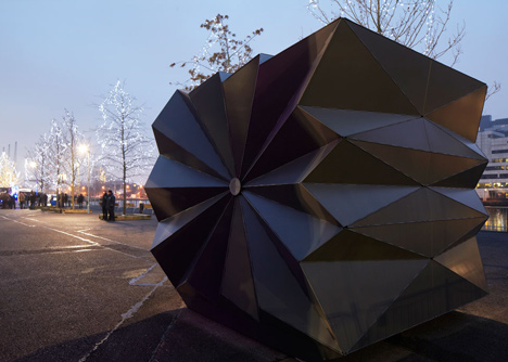 Folded metal kiosks by Make open like a paper fan