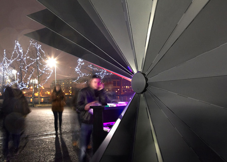 Folded metal kiosks by Make open like a paper fan